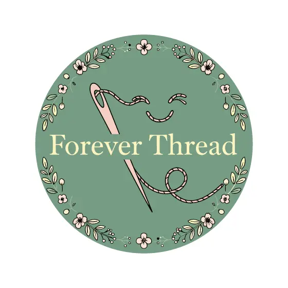 Winking Needle on Sage Badge