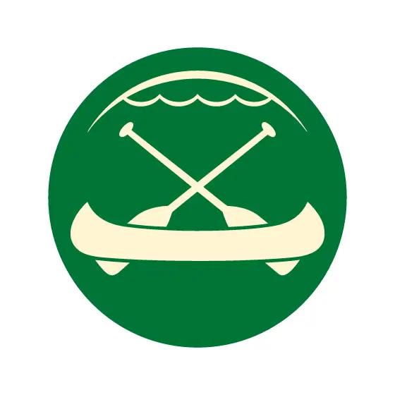 Canoe and Paddles with Lake Waves Emblem