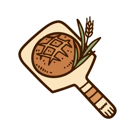 Sourdough Loaf on Peel with Wheat