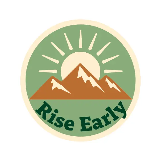 Rising Sun Over Mountains Badge